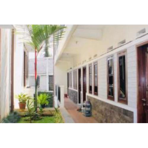 Hotel O Qq Kost Near Pantai Kebesaran Beach