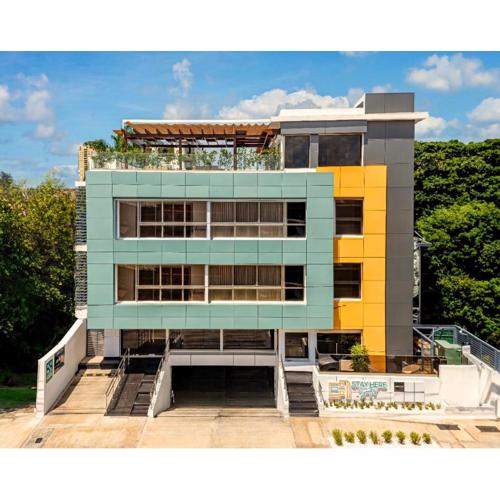 Hotel Stay Here Suites