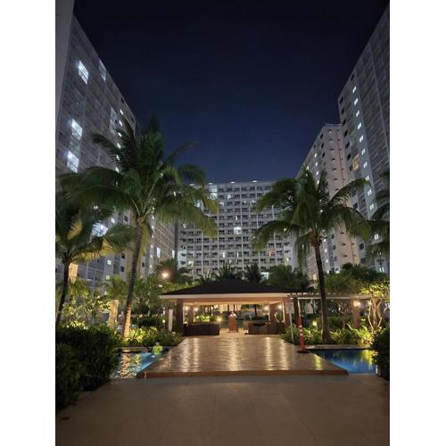 Industrial Design Bachelor's Pad with Pool View in Shore Residences