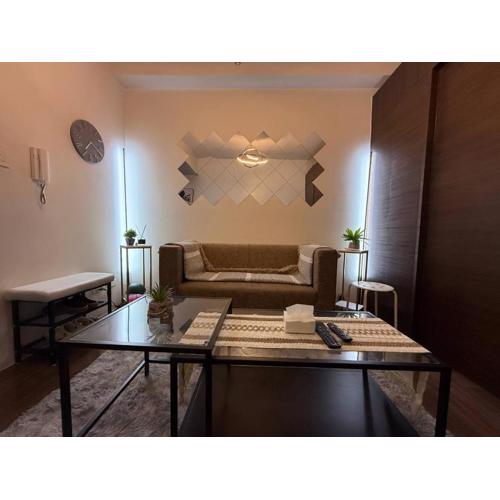 Iris Affordable and Neat Staycation at Air Residences Makati