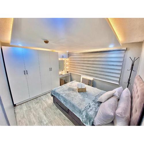 IV’s Condo w/ Netflix, Wifi & Karaoke