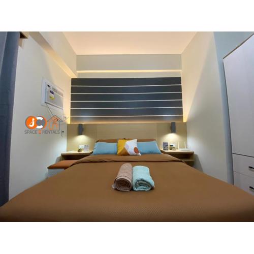 JC SpaceRentals 127B Amani Grand Resort Residences, balcony pool view, Ground floor, 5 mins frm airport, free wifi, Netflix