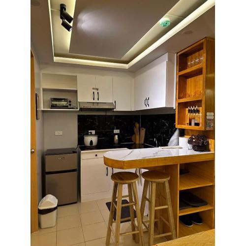 JoyStaycation Condo Hotel