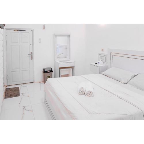 Kaku Maru Kostel Mitra RedDoorz