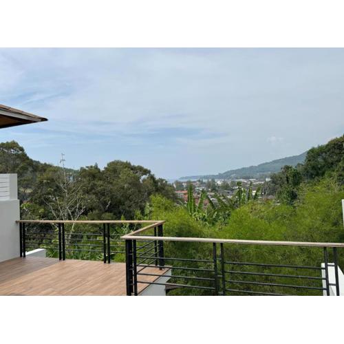 Kamala townhome with sea view terrace & pool