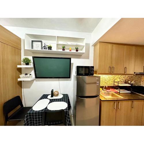 Kathys Crib with balcony Pool view at Shell Residence