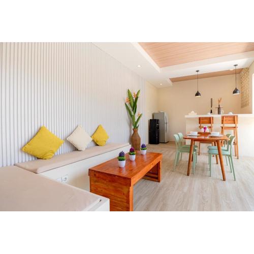 KIKI VILLAGE BATHTUB AND LIVING ROOM