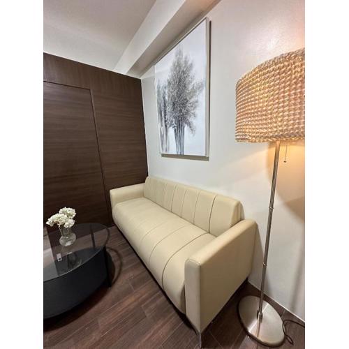 King size bed at Air Residences Condo, Ayala Ave, Makati