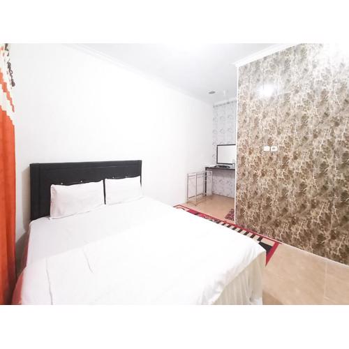 Lancar Homestay Syariah near BNS Mitra RedDoorz