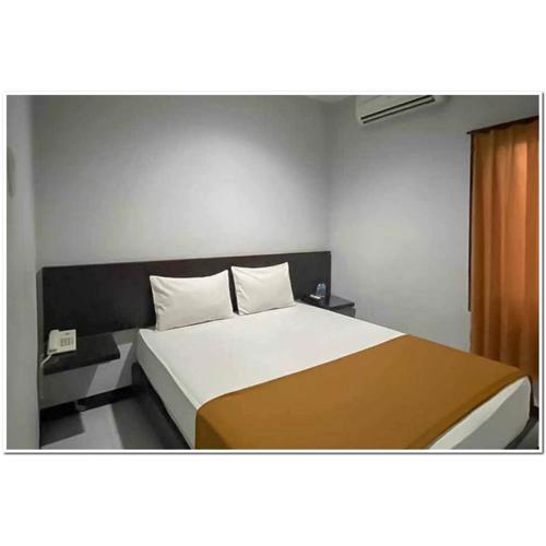 Losmen Family Syariah Bypass Juanda Mitra RedDoorz