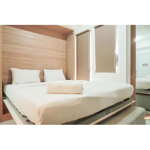 Lovely and Strategic Studio at Green Pramuka Apartment By Travelio