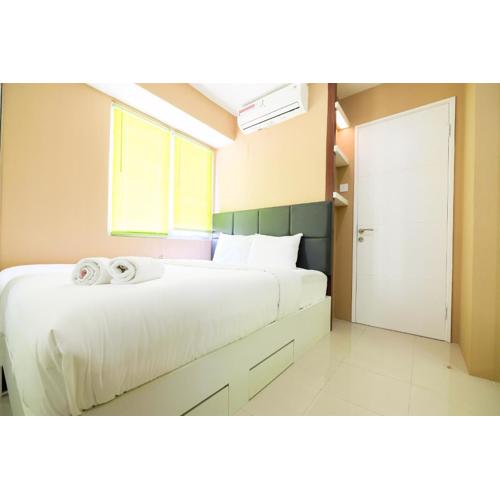 Luxurious 2BR Bassura City Apartment with Mall Access By Travelio