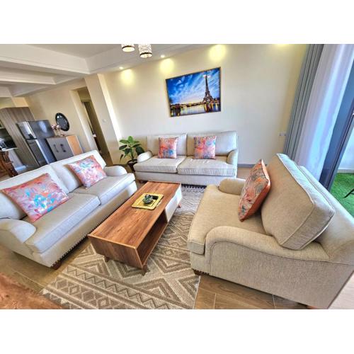 luxurious fully furnished two bedroom apartment with heated swimming pool fully equipped gym child play area and ample parking space and a relaxing rooftop with a breathtaking city views