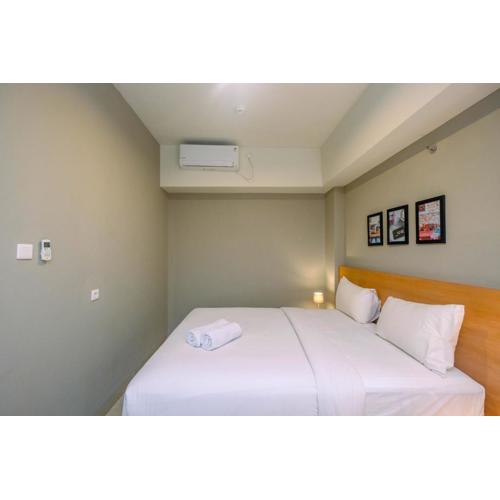 Luxury 1BR Apartment with Golf View at Mustika Golf Residence By Travelio