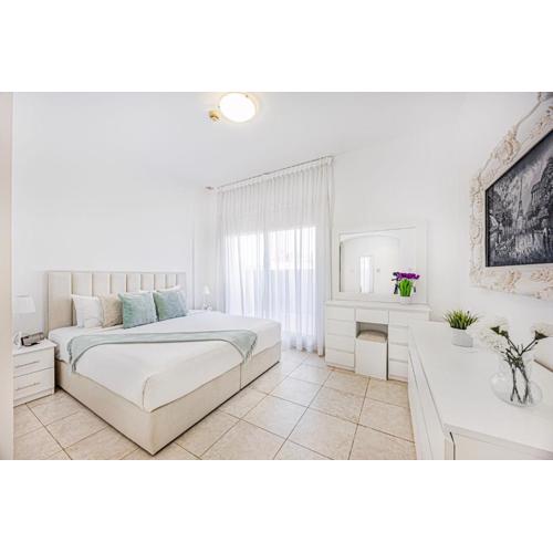 Luxury 2BR Haven with Expansive Terrace and Elegance