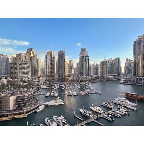 Luxury 2BR with Marina Views Near Dining Shopping Attractions & Beaches