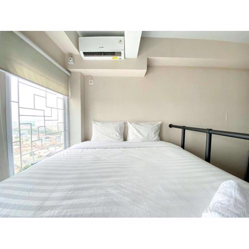 Luxury and Minimalist Studio at Patraland Urbano Apartment By Travelio