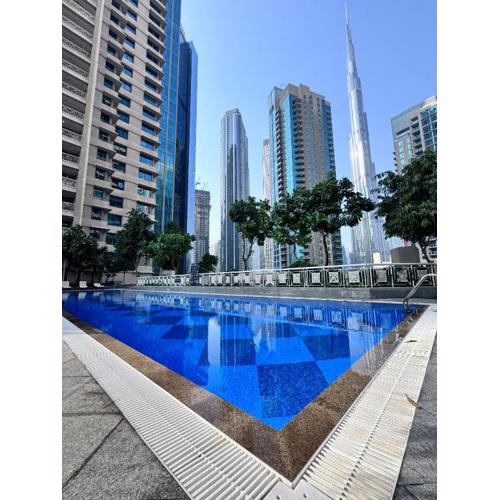 Luxury Burj Khalifa & Fountain View Apartments Steps to Dubai Mall by Simply Comfort