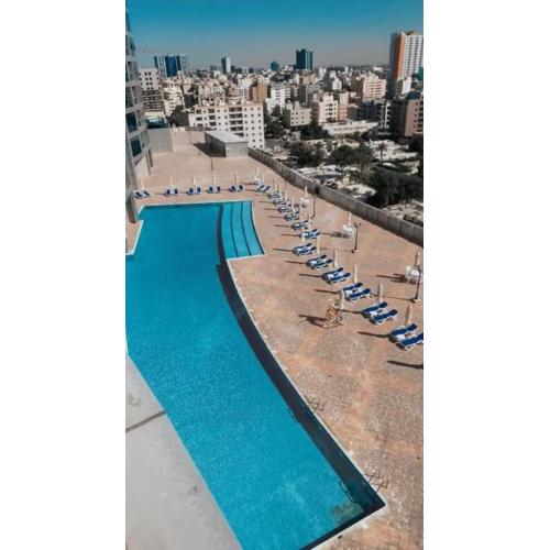 Luxury Corniche Residence 2 BHK pool gym wifi sea front