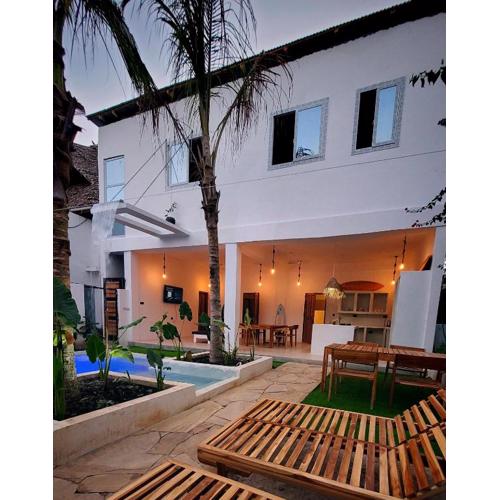 Luxury entire Private Villa Paje Beach Zanzibar TV WIFI AC private garden and cascading waterfall pool steps to the beach and amentites