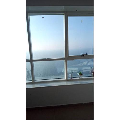 Luxury Room by the Sea Stunning View, King Bed, and Cozy Living Space - Room inside Apartment