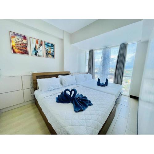 mactan newtown cozy room with wifi and pool access that you can enjoy