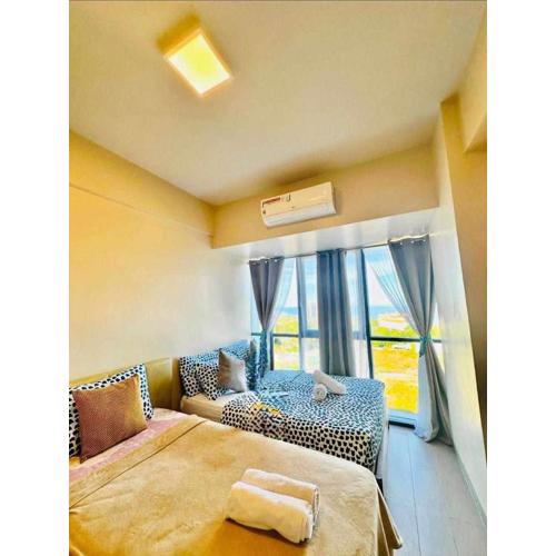 MACTAN NEWTOWN FAMILY ROOM Deluxe with free wi-fi, POOL & GYM