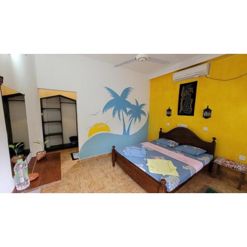 Malika's Yellow House