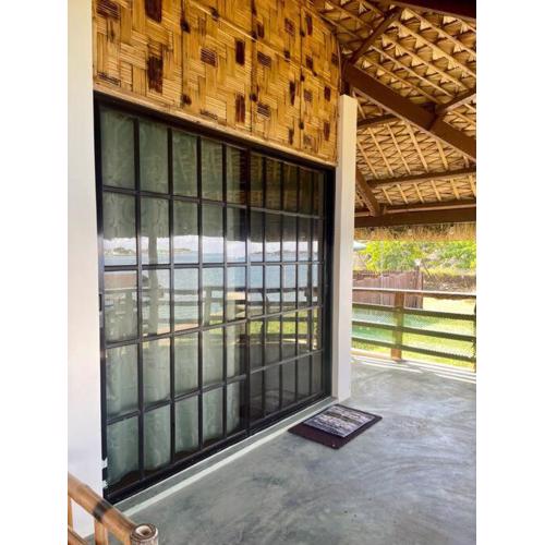 Maria Kulafu Kubo House 1 BIG BEDROOM with Wifi