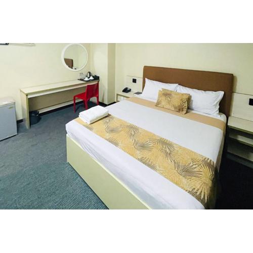 Marianne Suites Hotel by RedDoorz