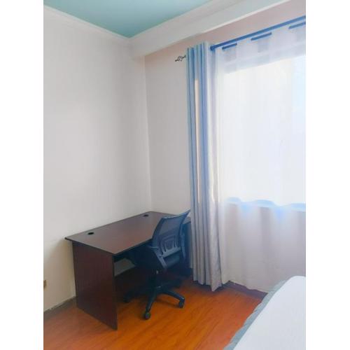 metro living retreat three bedroom apartment with swimming pool, fully equipped gym, ample parking space, and proximity to major shopping malls