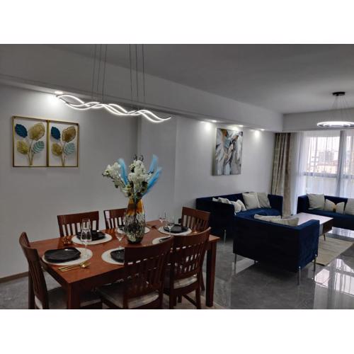 metro living retreat three bedroom apartment with swimming pool, fully equipped gym, ample parking space, and proximity to major shopping malls