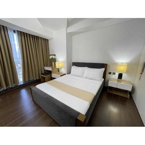 Minimalist 1BR Condo with NETFLIX at AEON TOWERS near Abreeza Mall by Rico