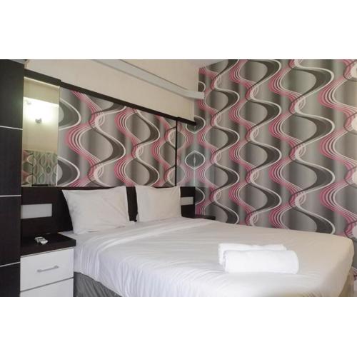 Minimalist 2BR Apartment at Dian Regency By Travelio