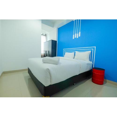 Minimalist 2BR Apartment at Springhill Terrace Residence By Travelio