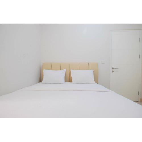 Minimalist 2BR Apartment The Springlake Summarecon By Travelio