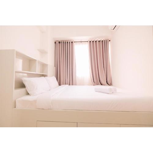 Minimalist 2BR Bassura Apartment Direct Access to Bassura City Mall By Travelio