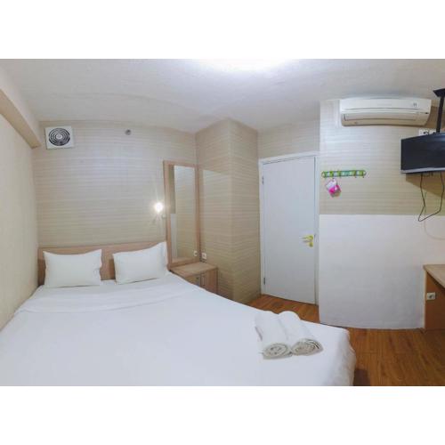 Minimalist and Combine 2BR at Green Pramuka City Apartment By Travelio