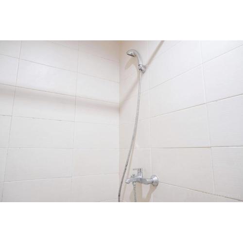 Minimalist and Comfort Studio at Belmont Residence Puri Apartment By Travelio