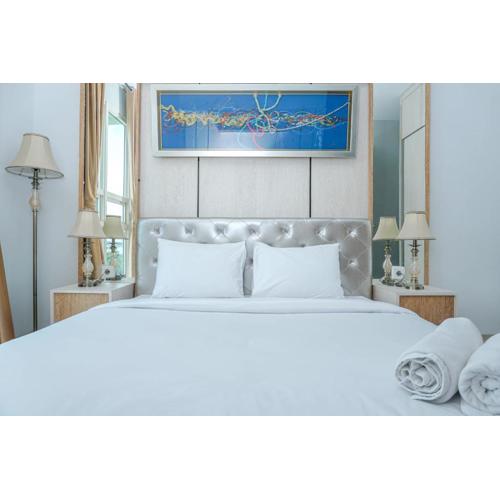 Minimalist and Comfy 1BR CitraLake Suites Apartment By Travelio