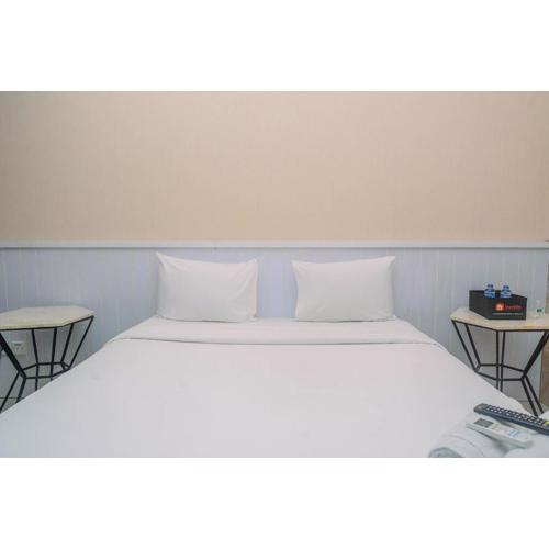 Minimalist and Comfy Studio at Grand Dhika City Apartment By Travelio