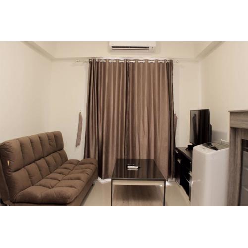 Minimalist and Cozy 3BR at Meikarta Apartment By Travelio