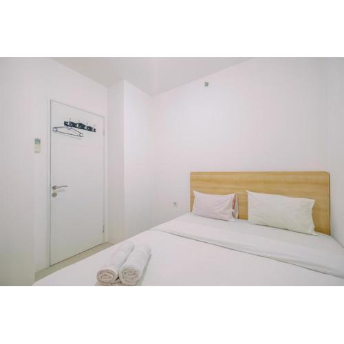 Minimalist and Cozy Living 2BR at Bassura City Apartment By Travelio