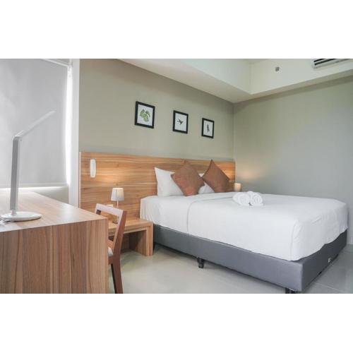 Minimalist and Cozy Stay 1BR Apartment at Mustika Golf Residence By Travelio