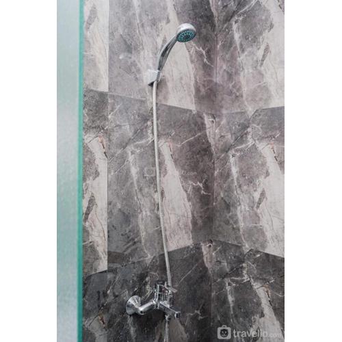 Minimalist and Cozy Studio Apartment at Tuscany Residences By Travelio