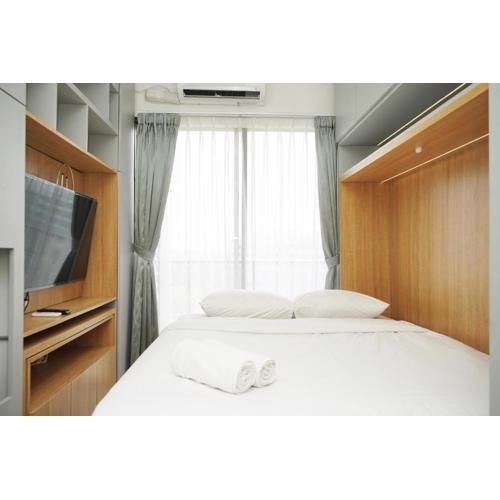 Minimalist and Cozy Studio at Sky House BSD Apartment By Travelio
