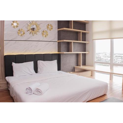 Minimalist and Cozy Studio at Vasanta Innopark Apartment By Travelio