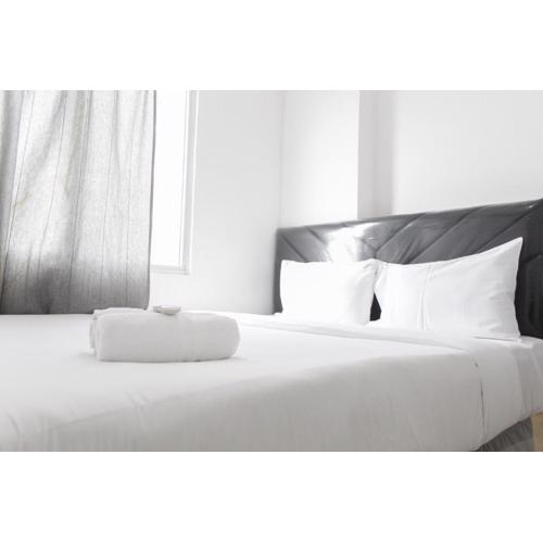 Minimalist and Enjoy 2BR at Bassura Apartment near Bassura Mall By Travelio