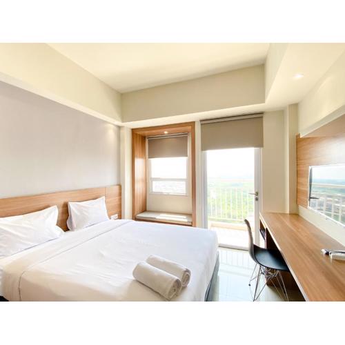 Minimalist and Homey Studio Apartment at Mustika Golf Residence By Travelio