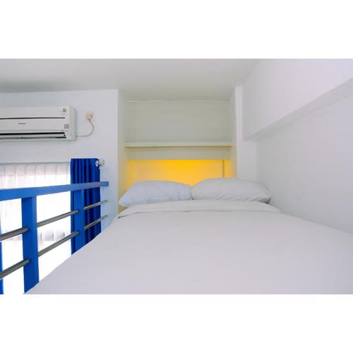 Minimalist and Posh Studio Dave Apartment By Travelio